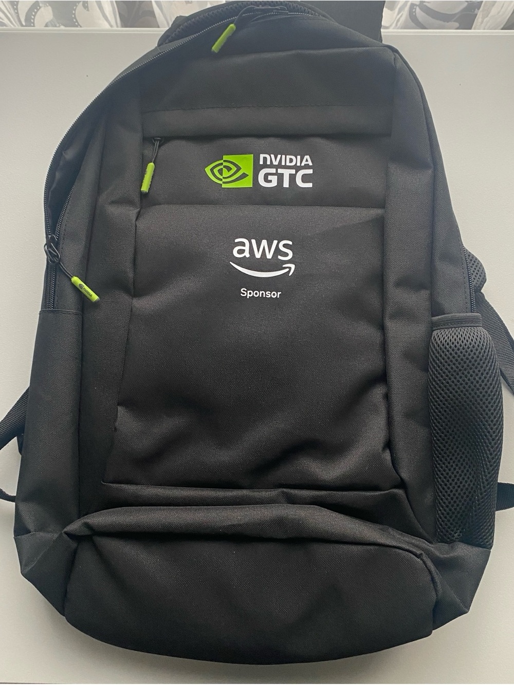 NVIDIA Black Backpack with Bright Green Accents and AWS Logo